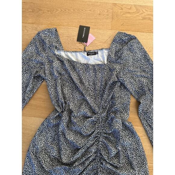 Pretty Little Thing Plus Cream Dalmation Print Ruched Front Bodycon Dress in Bla - Picture 2 of 8